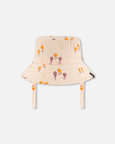 Chapeau cloche en mousseline pêche imprimée de poires
