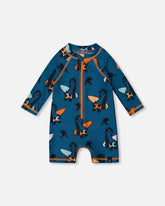 Rashguard une-pièce à manches longues imprimé de paresseux orange sur fond bleu marine