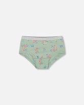 Culotte garçonne imprimée avec petites fleurs roses et bleues sur fond sauge claire en coton biologique