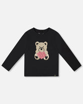 T-shirt en coton biologique noir avec nounours à paillettes réversibles