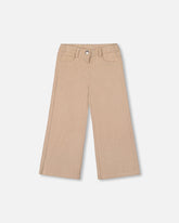Pantalon en velours côtelé à jambes larges beige