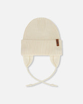 Bonnet en tricot de mi-saison beige pâle pour bébé