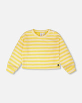 Pull rayé jaune et blanc
