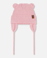 Bonnet en tricot rose pâle pour bébé